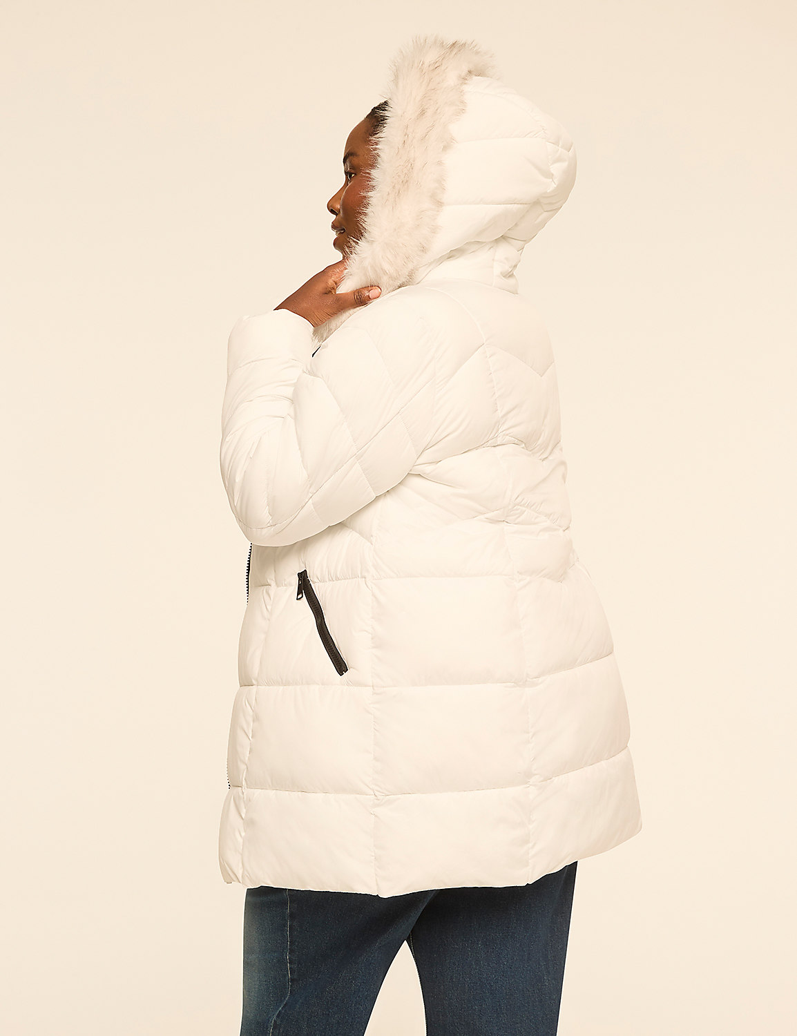 A woman in a white puffer coat with a fur-lined hood stands against a plain, light-colored background. Product Image 2