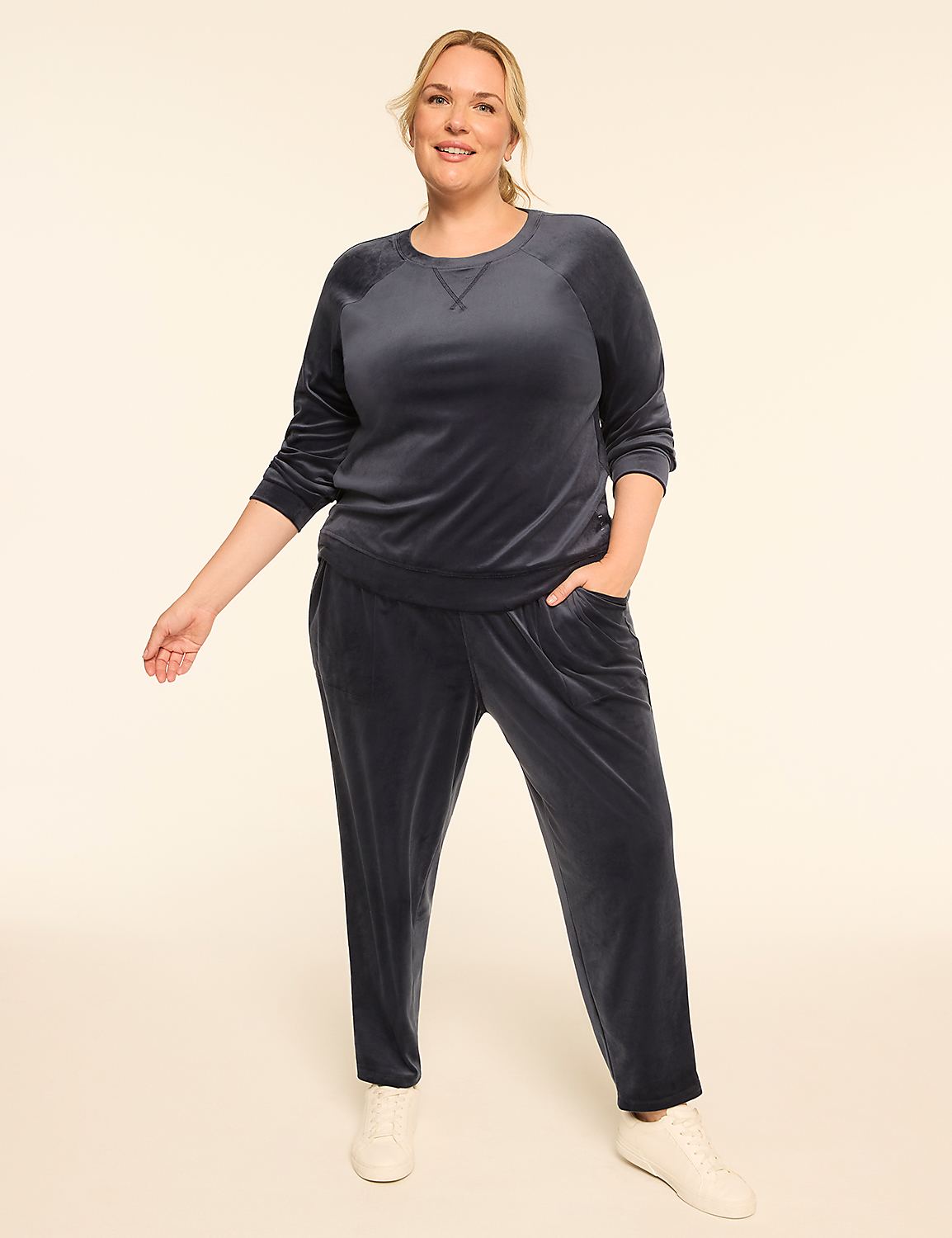 A plus-size woman in a navy velvet tracksuit stands against a plain, light-colored background. Product Image 3