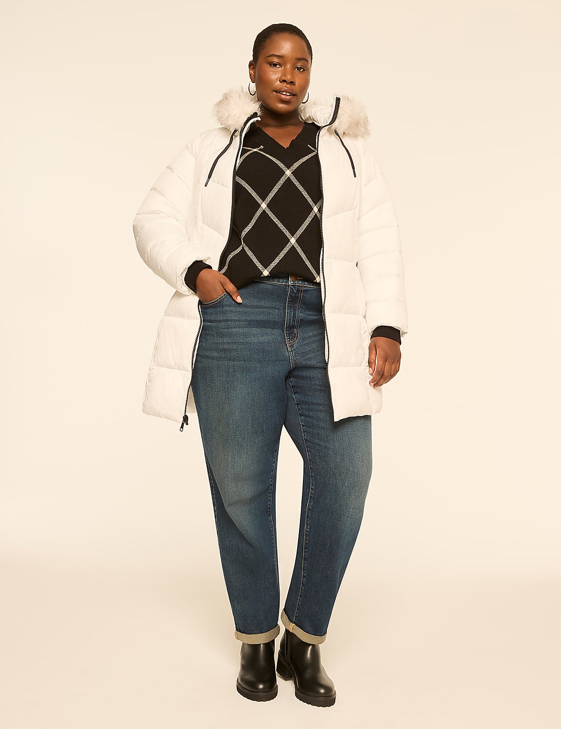 A woman in a white puffer coat and jeans stands against a plain, light-colored background. Product Image 3