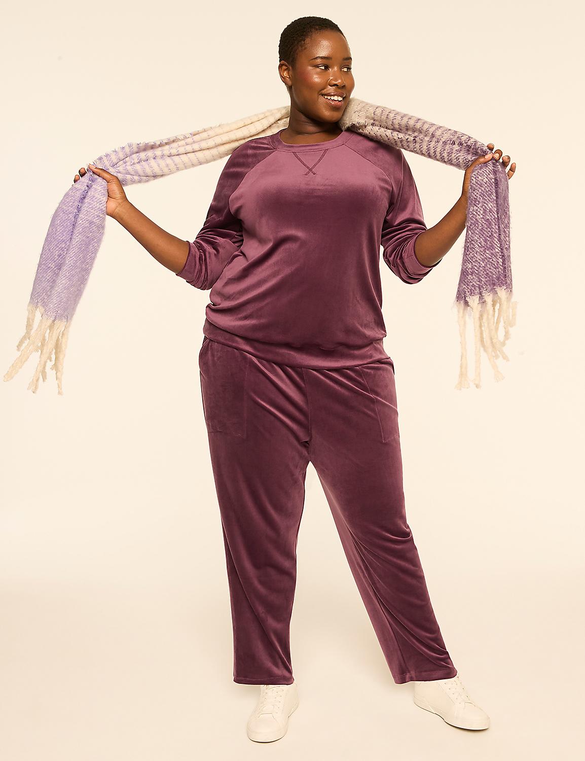 A woman in a purple velvet tracksuit and a striped scarf stands against a plain, light-colored background. Product Image 3