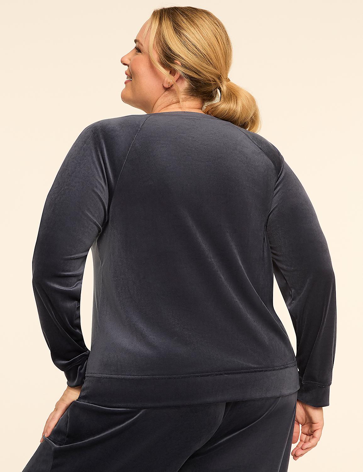 A woman in a dark grey velour top and pants stands against a plain beige background. Product Image 2
