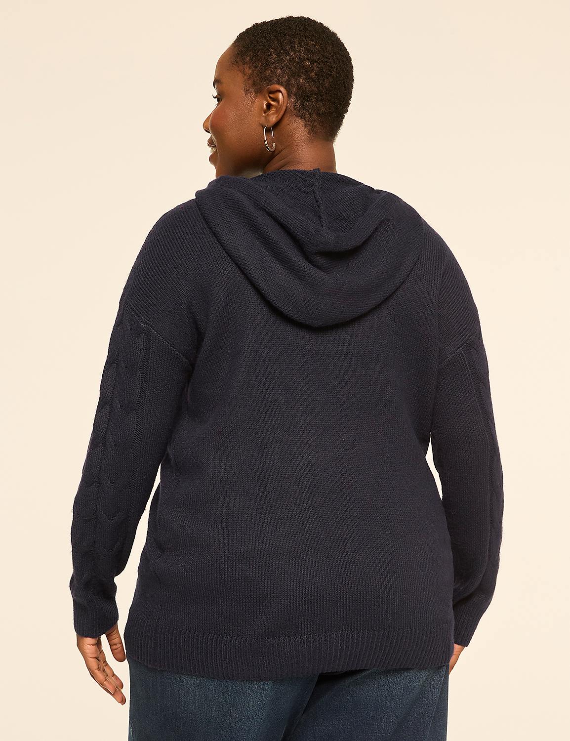 A woman in a navy blue hooded sweater and jeans stands against a plain, light-colored background. Product Image 2