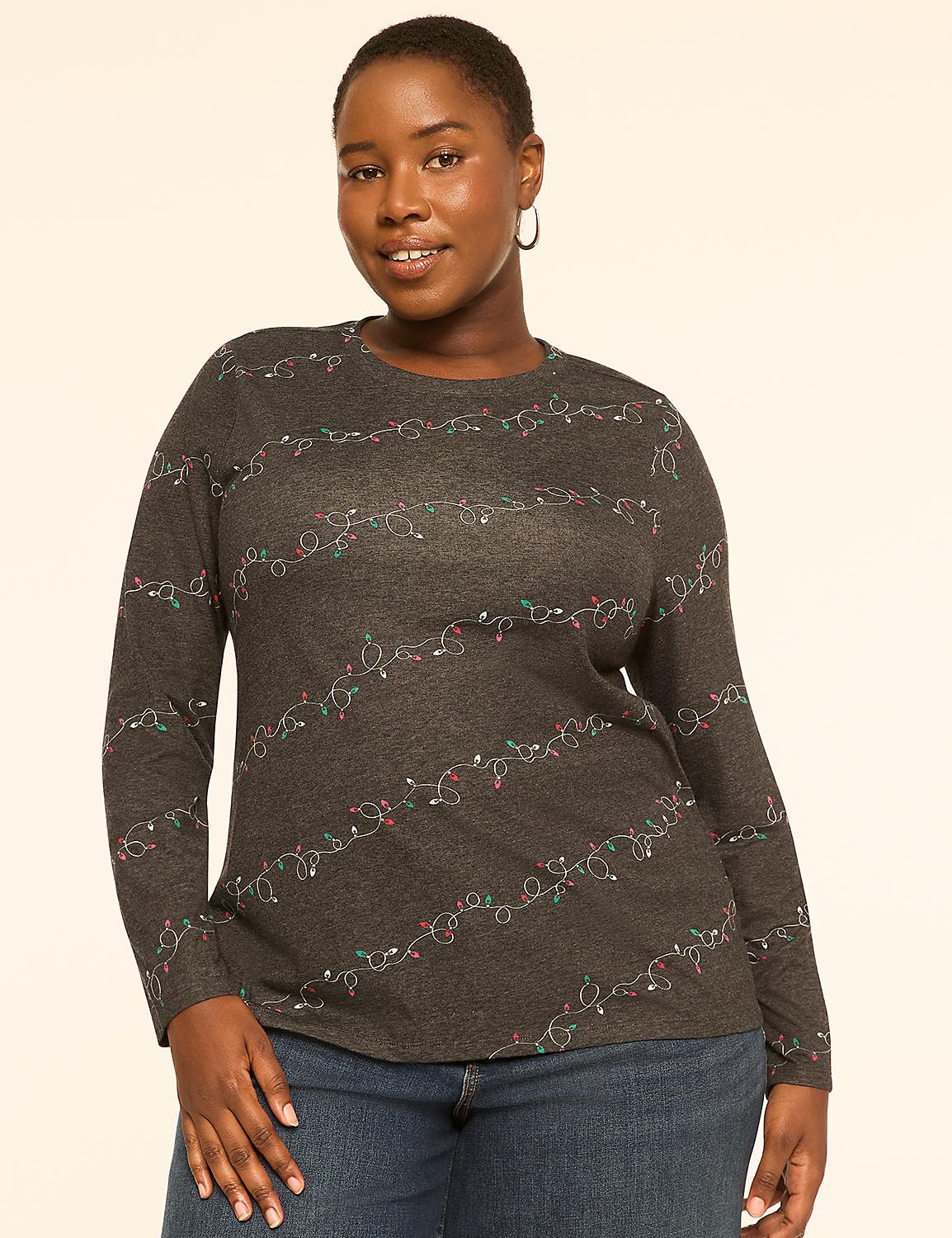 A woman in a dark gray long-sleeved shirt with a string light pattern stands against a plain, light-colored background. Product Image 1