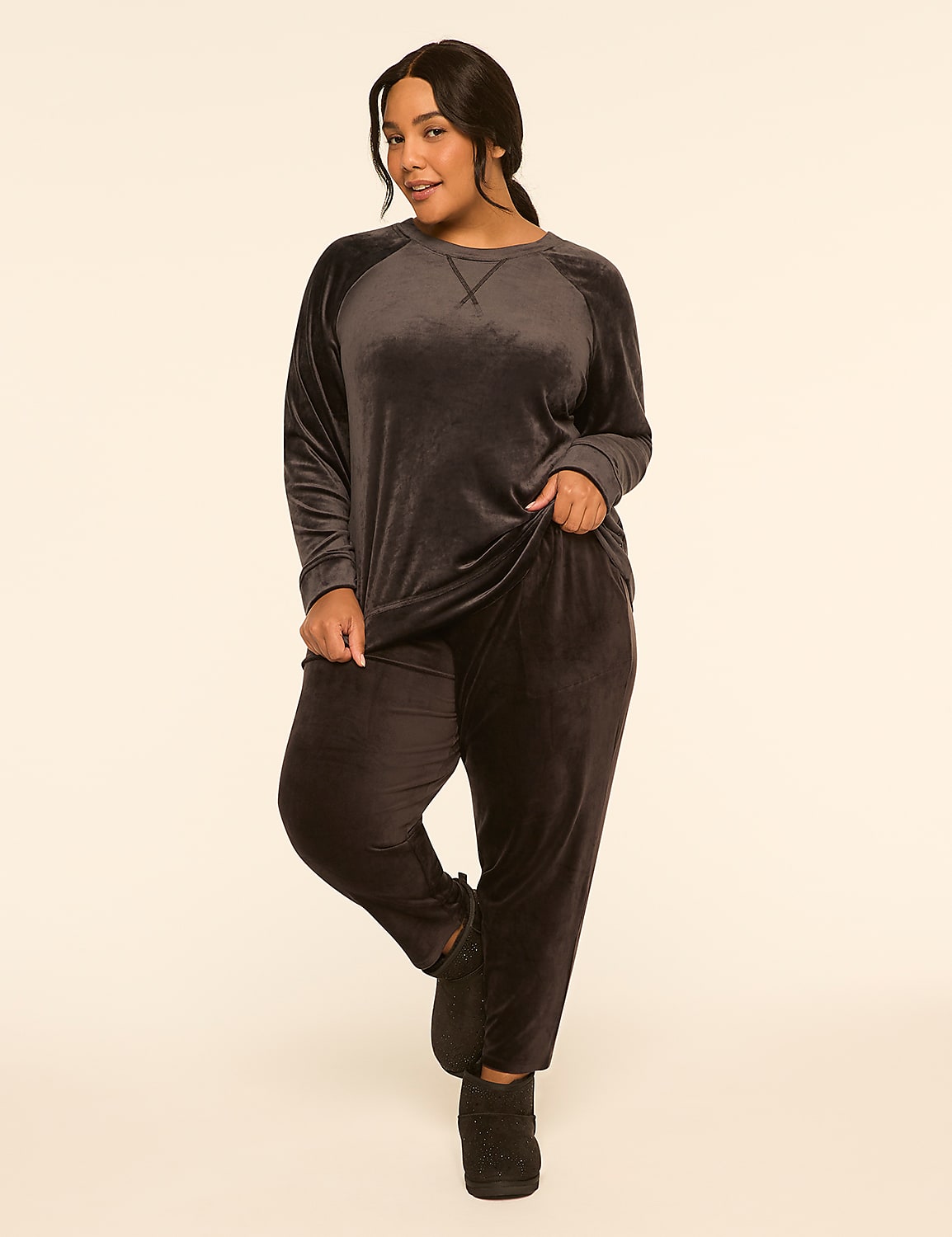 A woman in a gray velvet loungewear set stands on one leg against a plain, light-colored background. Product Image 3