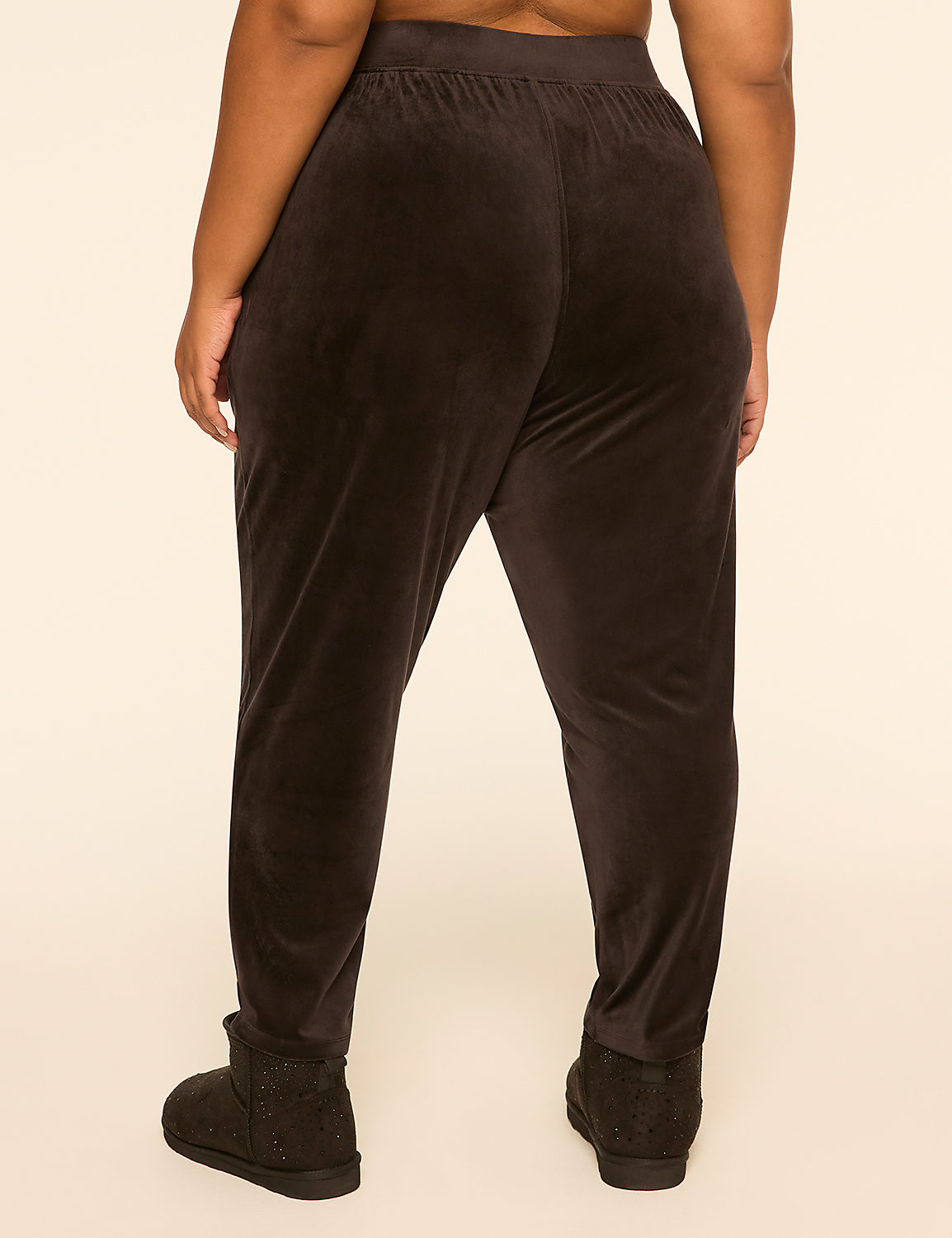 A person wearing dark velour pants and sparkly boots stands against a plain, light-colored background. Product Image 2