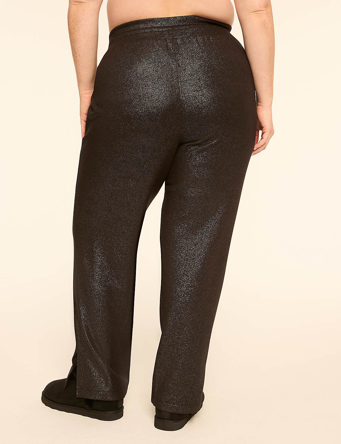 A person wearing sparkly black pants and black shoes stands against a plain, light-colored background. Product Image 2