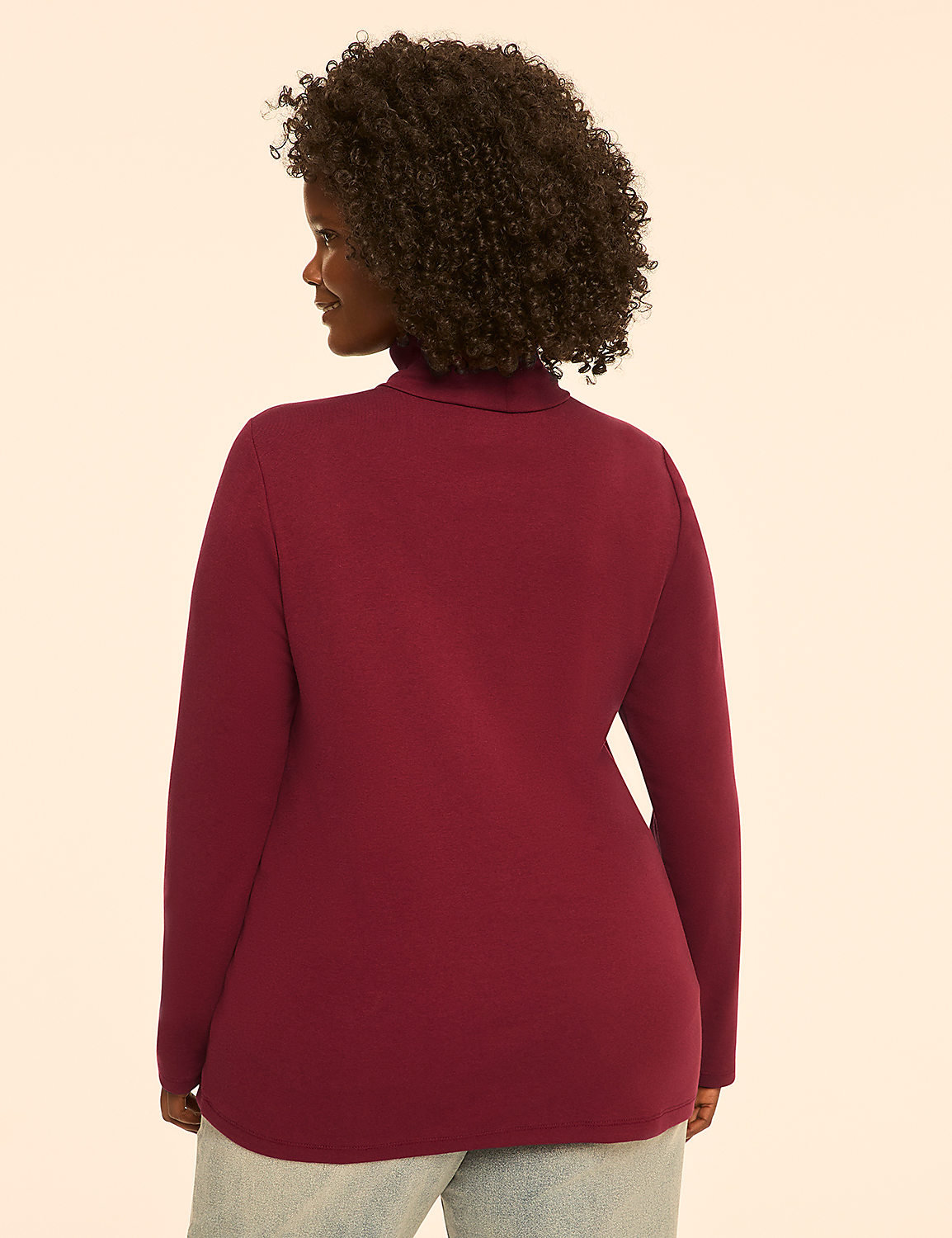 A woman in a red turtleneck is shown from the back against a plain, light-colored background. Product Image 2