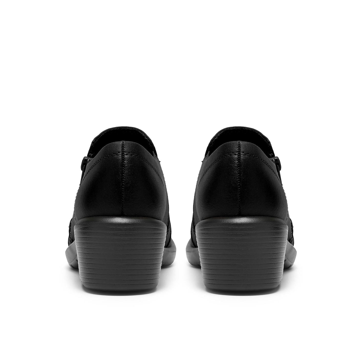 A pair of black leather shoes is positioned in the foreground against a plain white background. Product Image 2