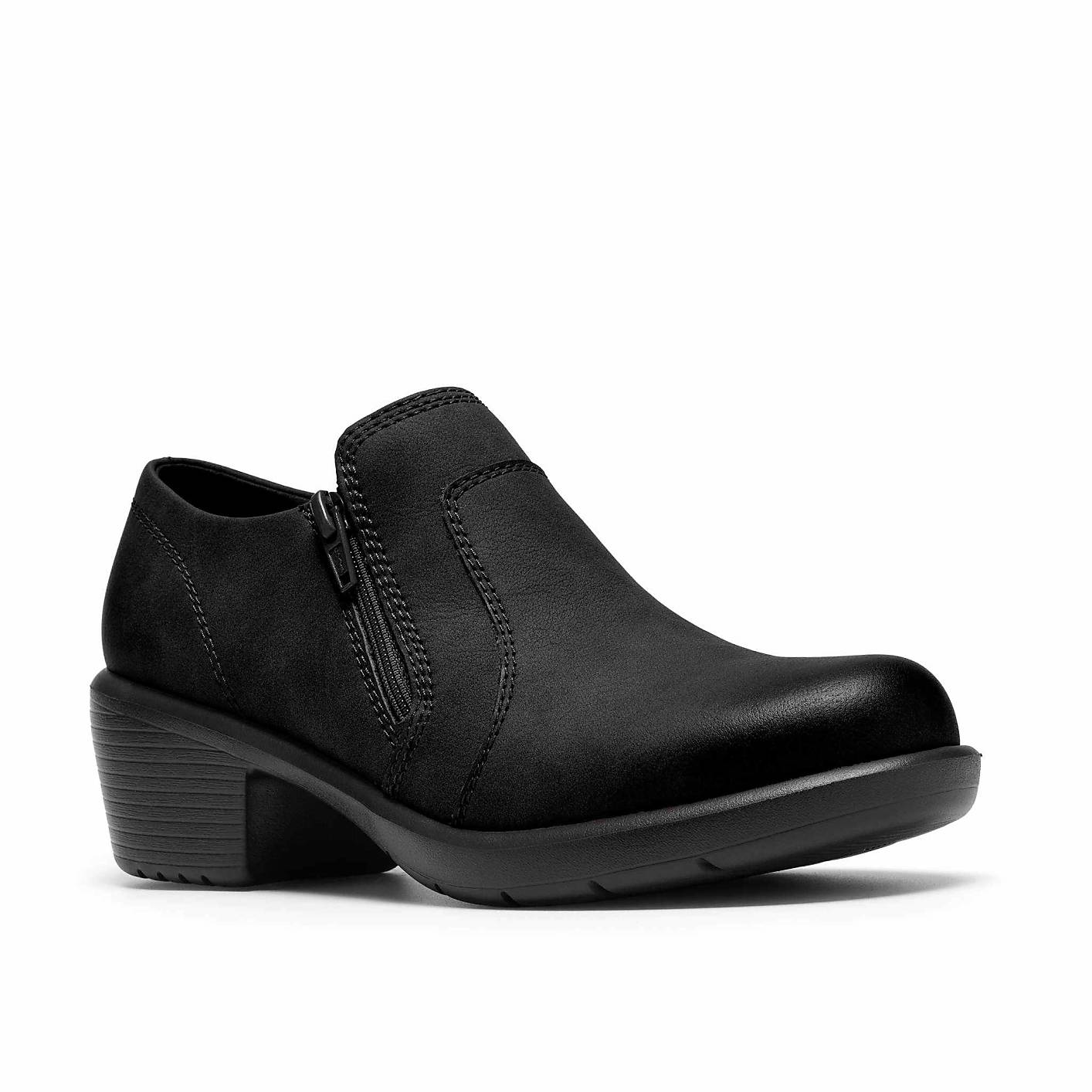 A black leather ankle boot with a side zipper sits against a plain white background. Product Image 5