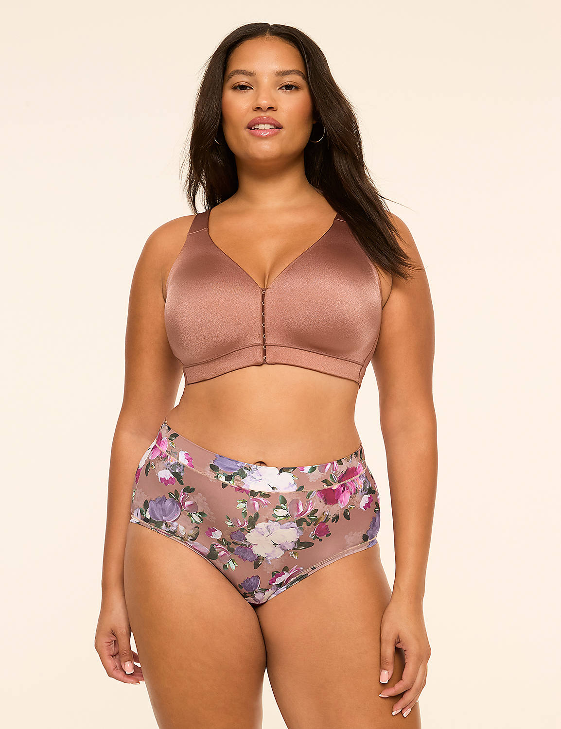 A woman wearing a brown bralette and floral print panties stands against a plain, light-colored background. Product Image 4