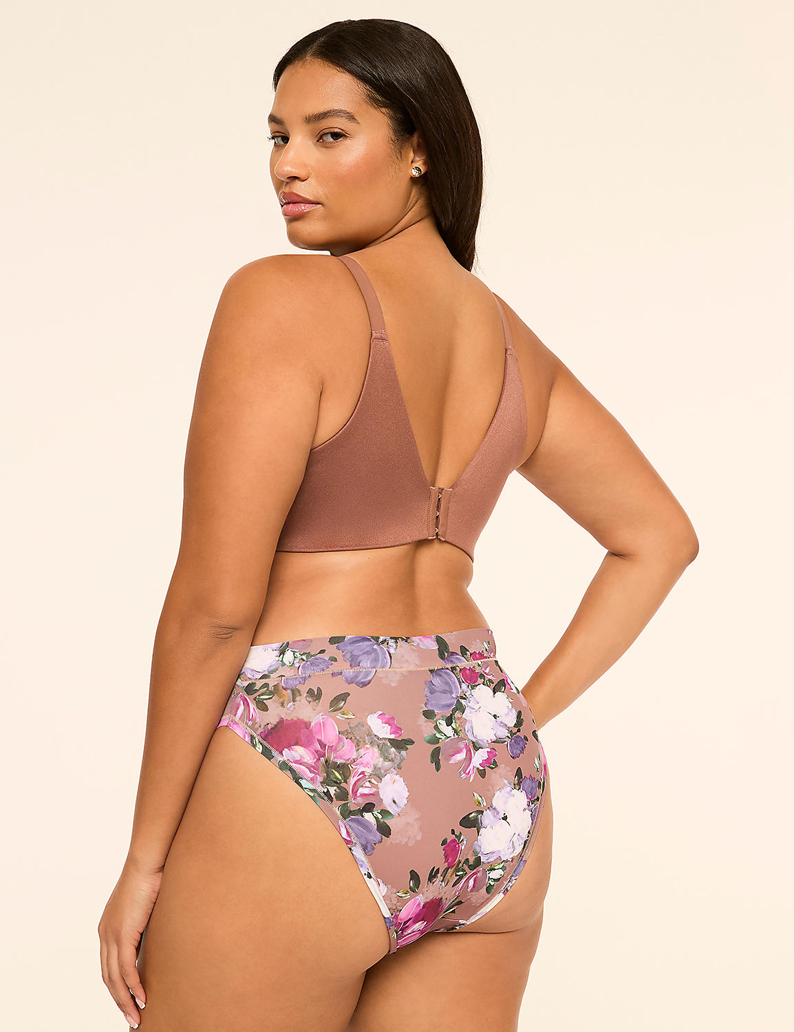A woman wearing a brown bra and floral-print panties stands against a plain, light-colored background. Product Image 2