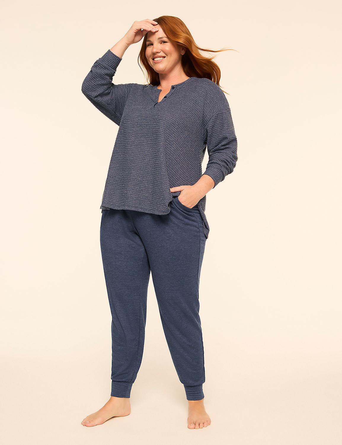 A smiling woman with red hair wears blue pajama set against a plain, light-colored background. Product Image 3