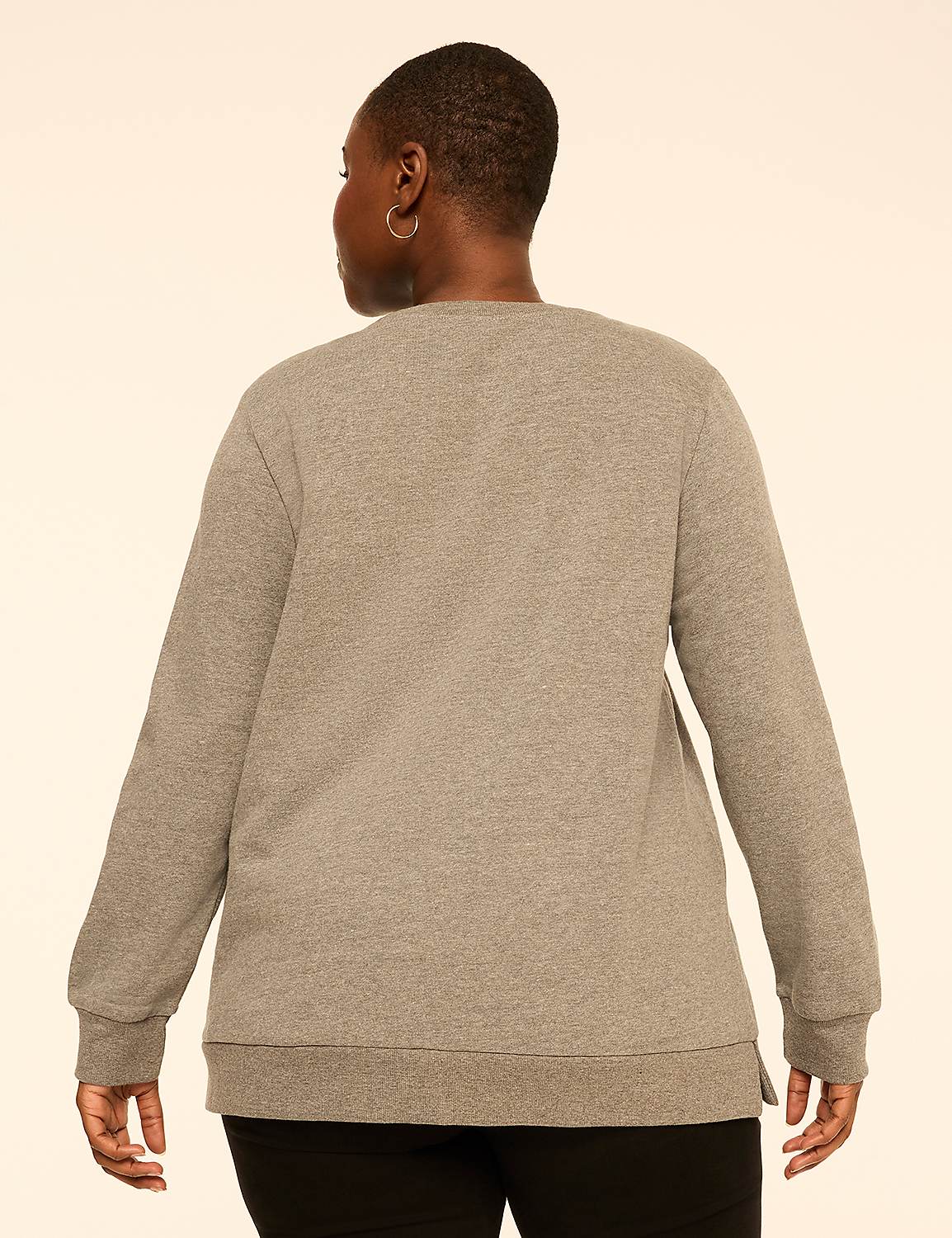 A person wearing a grey long-sleeved sweatshirt and black pants stands with their back to the camera against a plain, light-colored background. Product Image 2