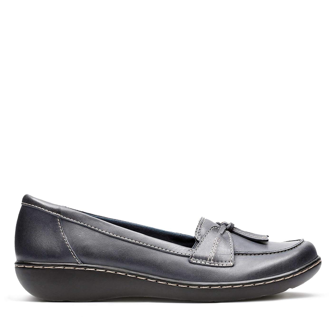 A single navy blue loafer with white stitching sits against a plain white background. Product Image 1