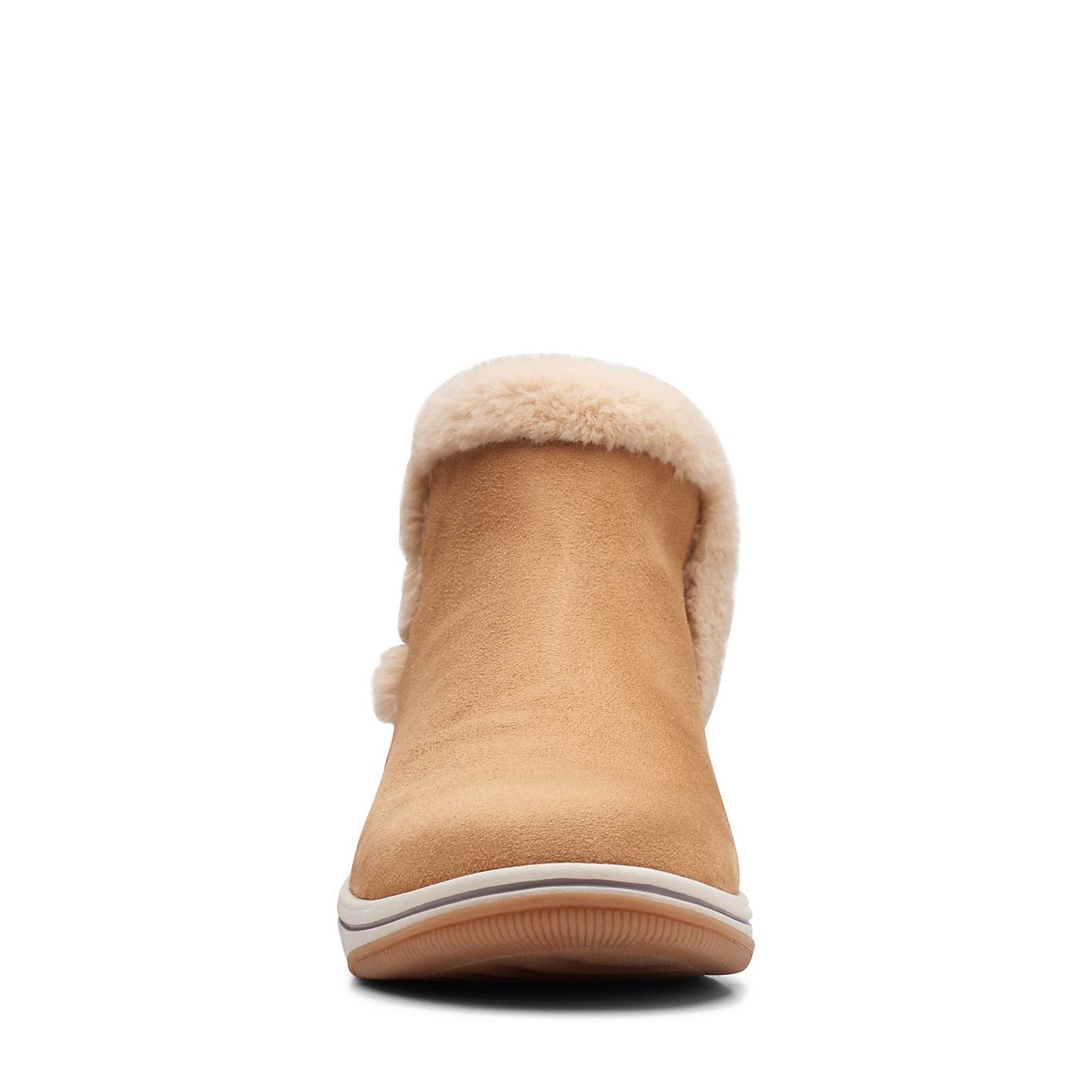 A tan suede boot with a fluffy faux-fur collar stands centered against a plain white background. Product Image 4