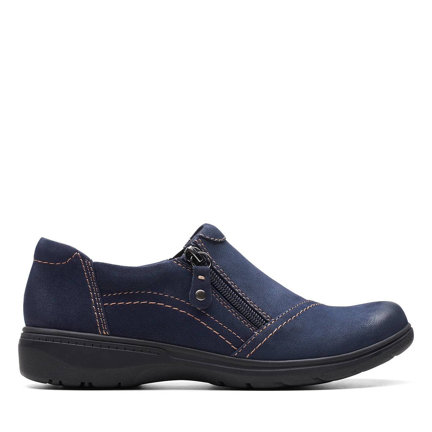 A single navy blue suede shoe with a zipper sits in the foreground against a plain white background. Product Image 1