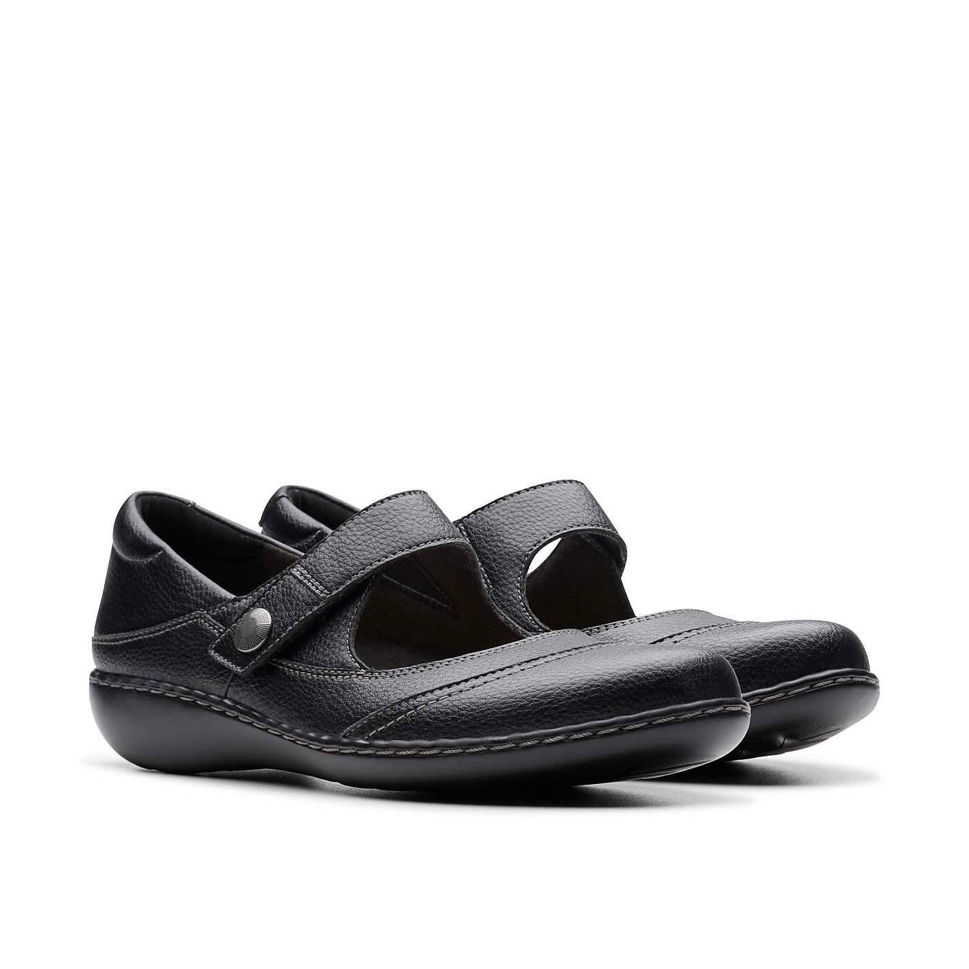 A pair of black leather Mary Jane shoes sits against a plain white background. Product Image 5