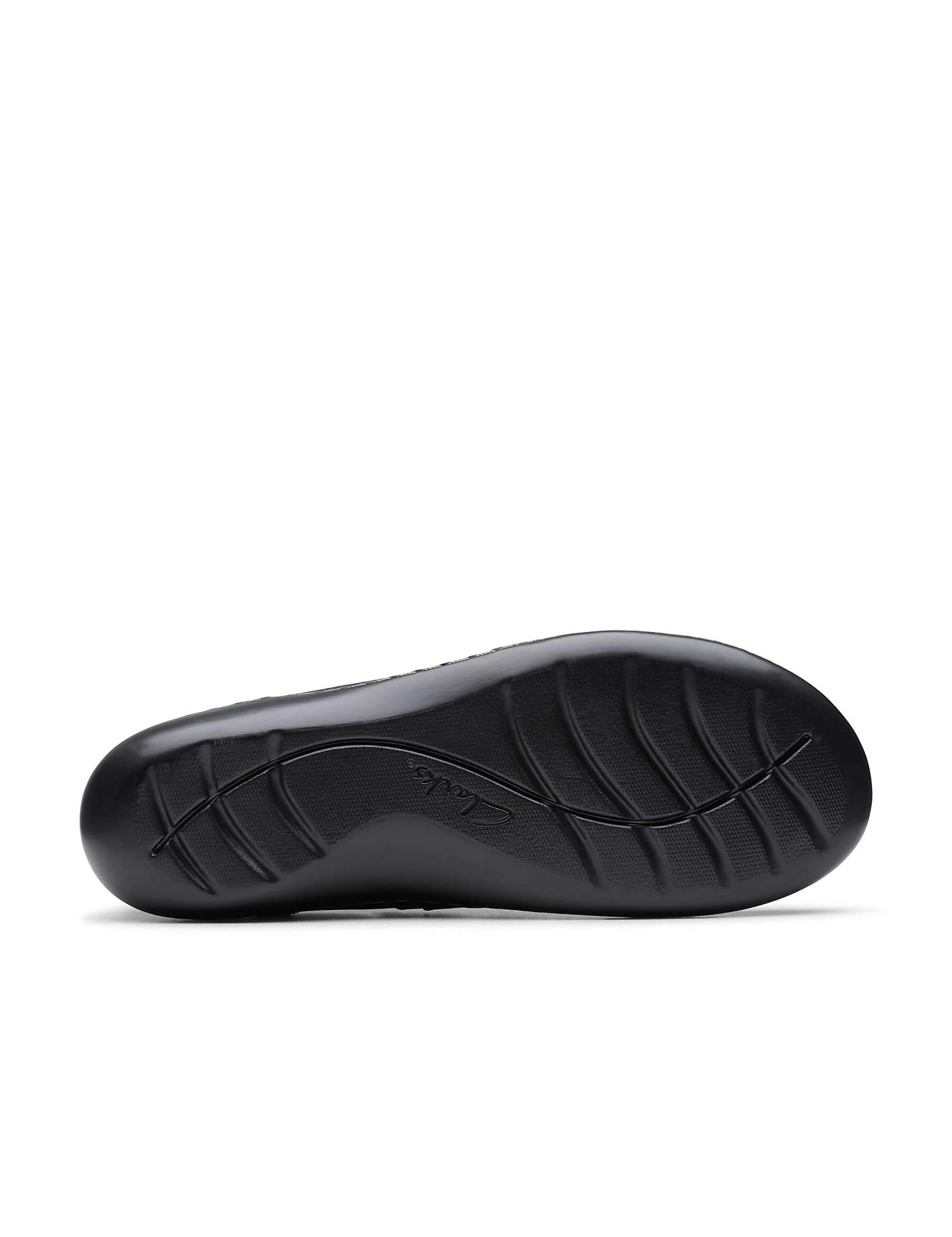 A black shoe sole with a textured grip is centered against a plain white background. Product Image 4