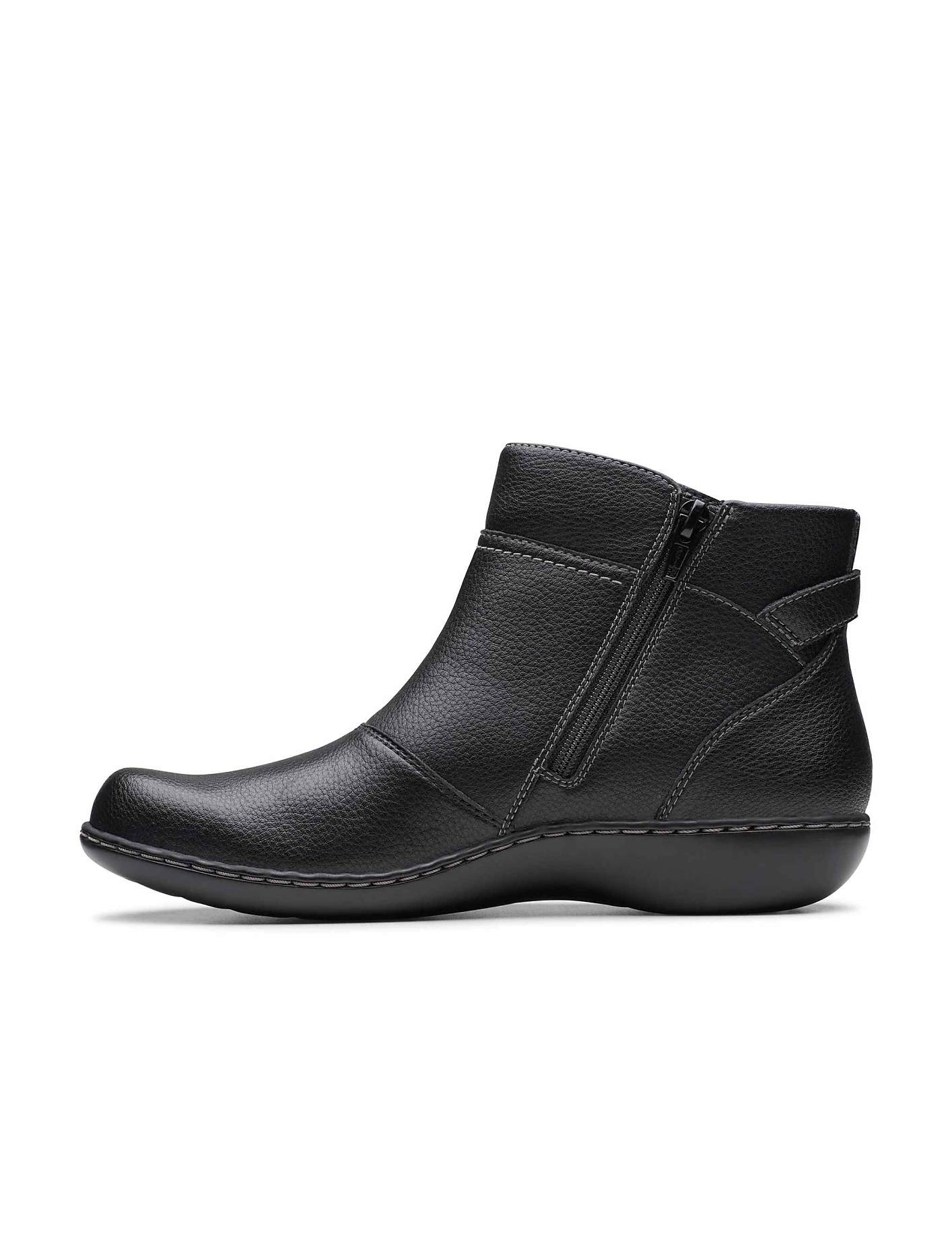 A black leather ankle boot with a side zipper sits against a plain white background. Product Image 3
