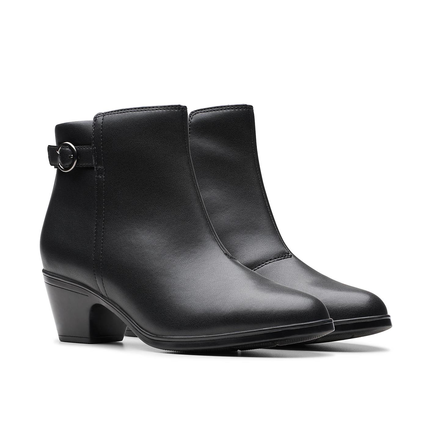 A black sock boot with a pointed toe and kitten heel stands against a plain white background. Product Image 5