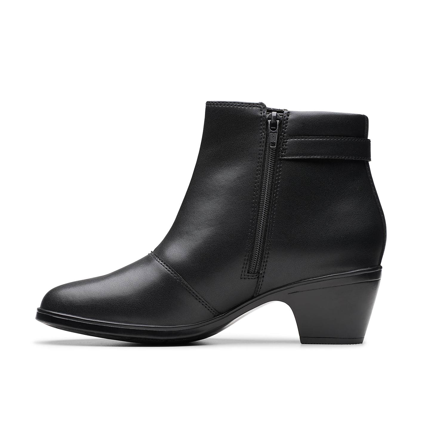 A black sock boot with a pointed toe and kitten heel stands against a plain white background. Product Image 3
