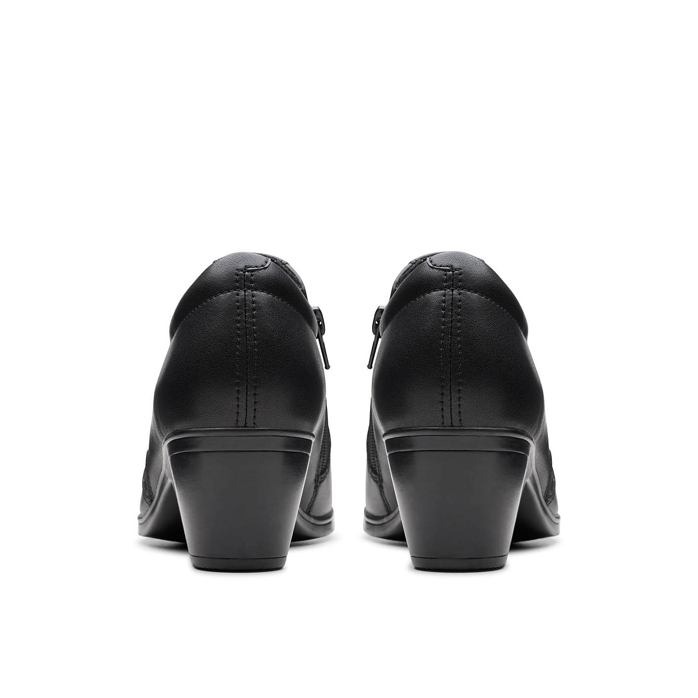 A pair of black heeled shoes is positioned in the foreground against a plain white background. Product Image 2