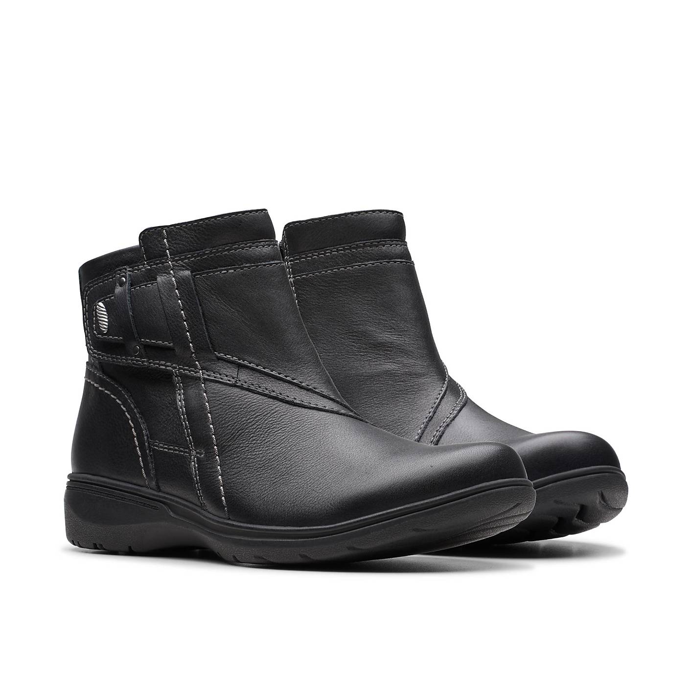 A pair of black leather ankle boots stands against a plain white background. Product Image 5