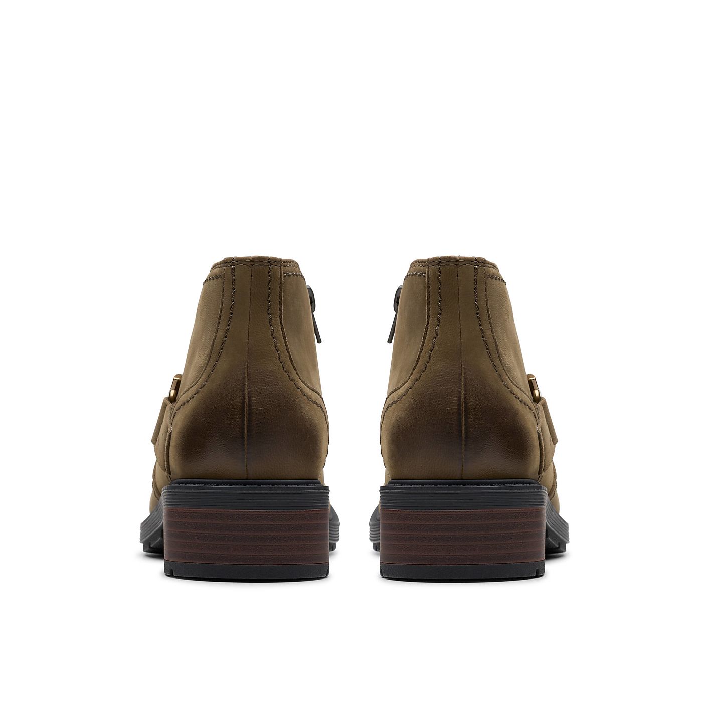 A pair of brown leather boots are positioned centrally against a plain white background. Product Image 2