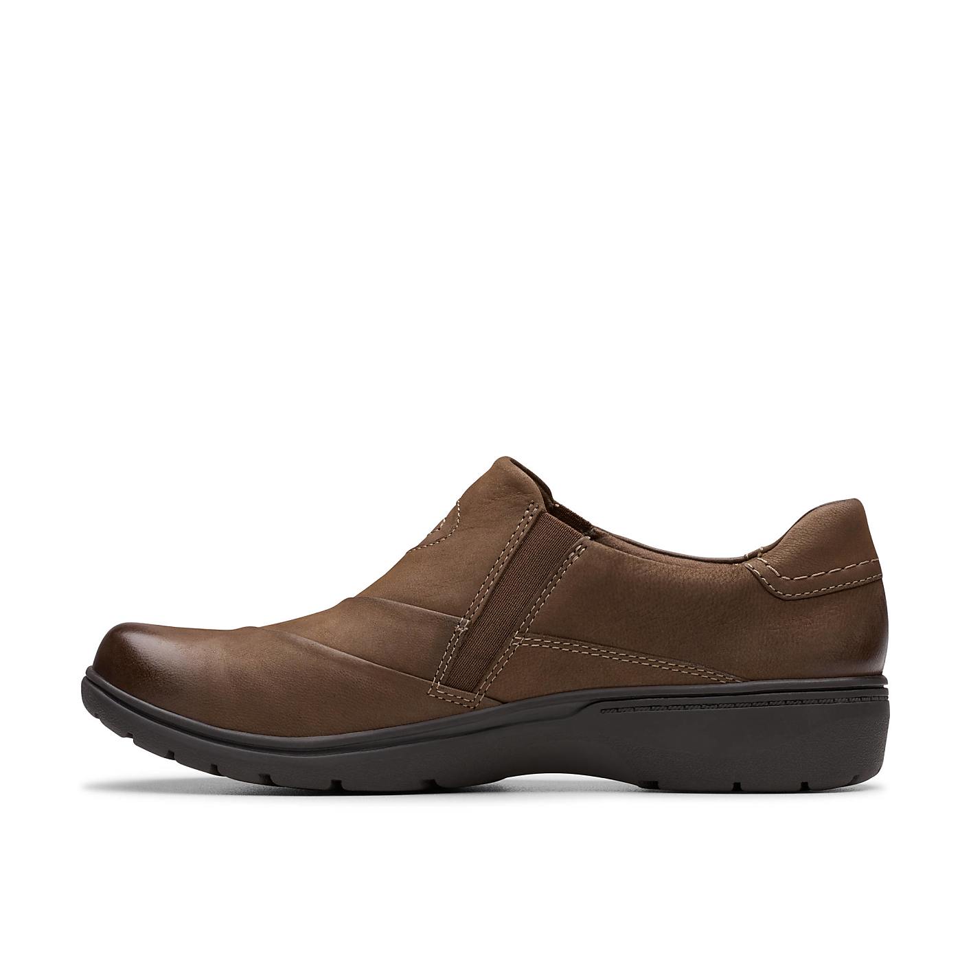 A brown leather slip-on shoe sits centered against a plain white background. Product Image 3