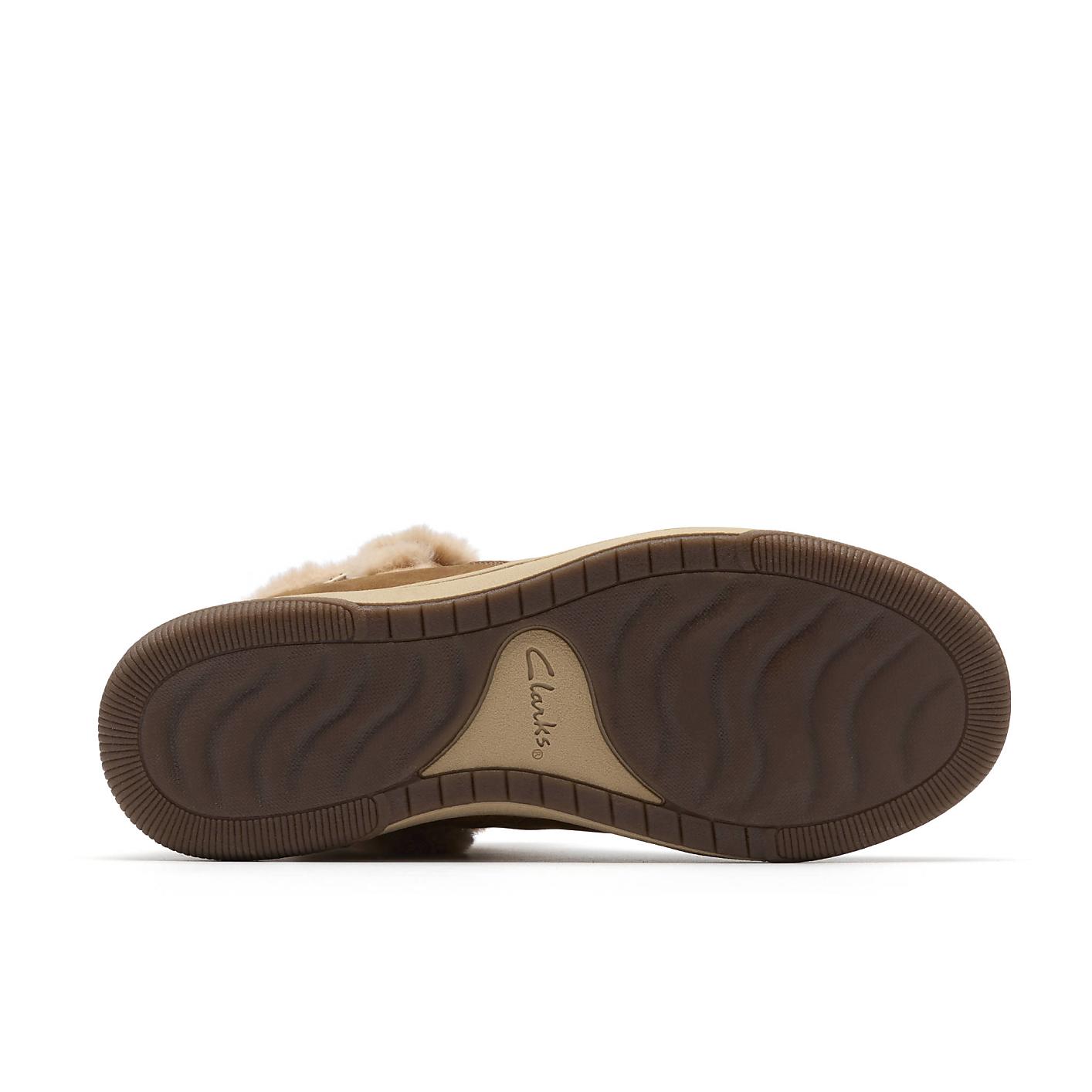 A brown Clarks boot sole is positioned in the foreground against a plain white background. Product Image 4