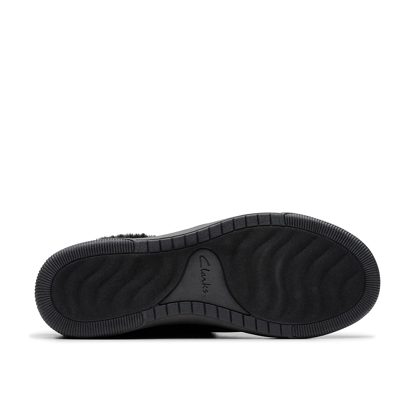 A black Clarks shoe sole is centered in the foreground against a plain white background. Product Image 4