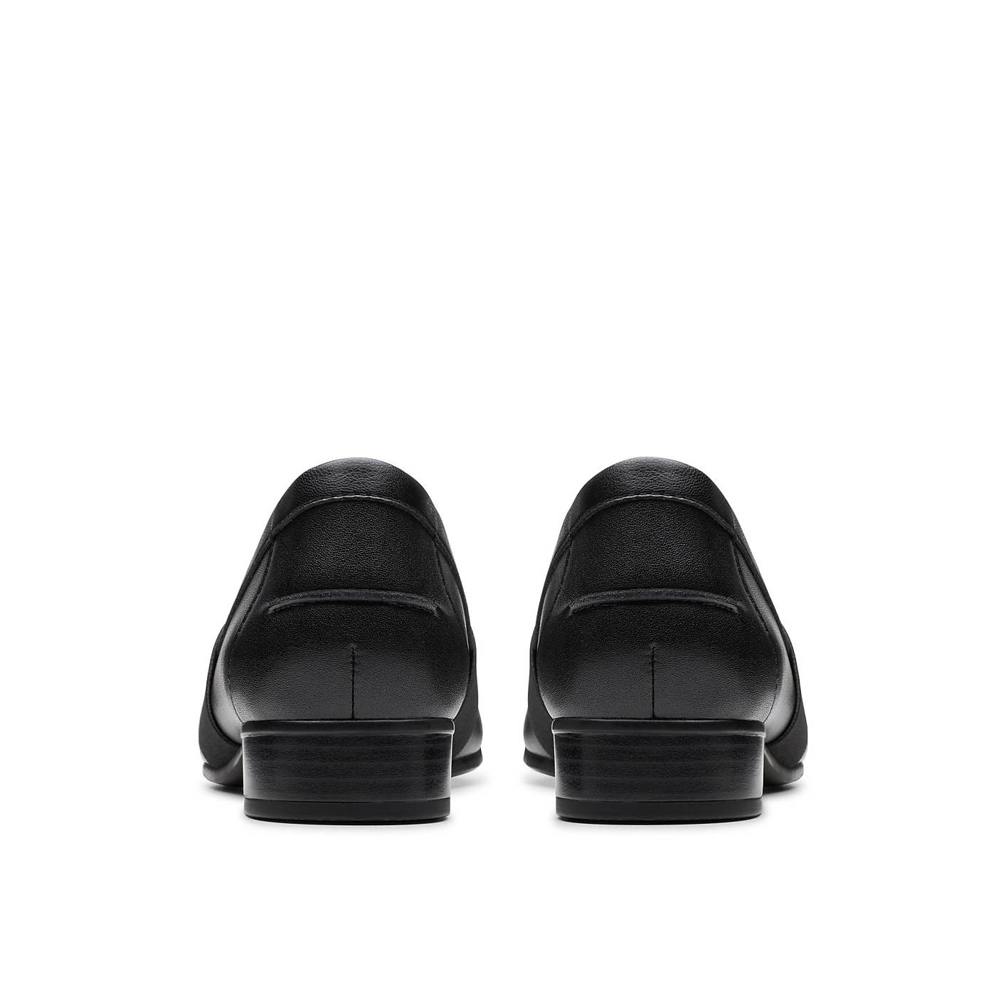 A pair of black leather loafers are positioned in the foreground against a plain white background. Product Image 2