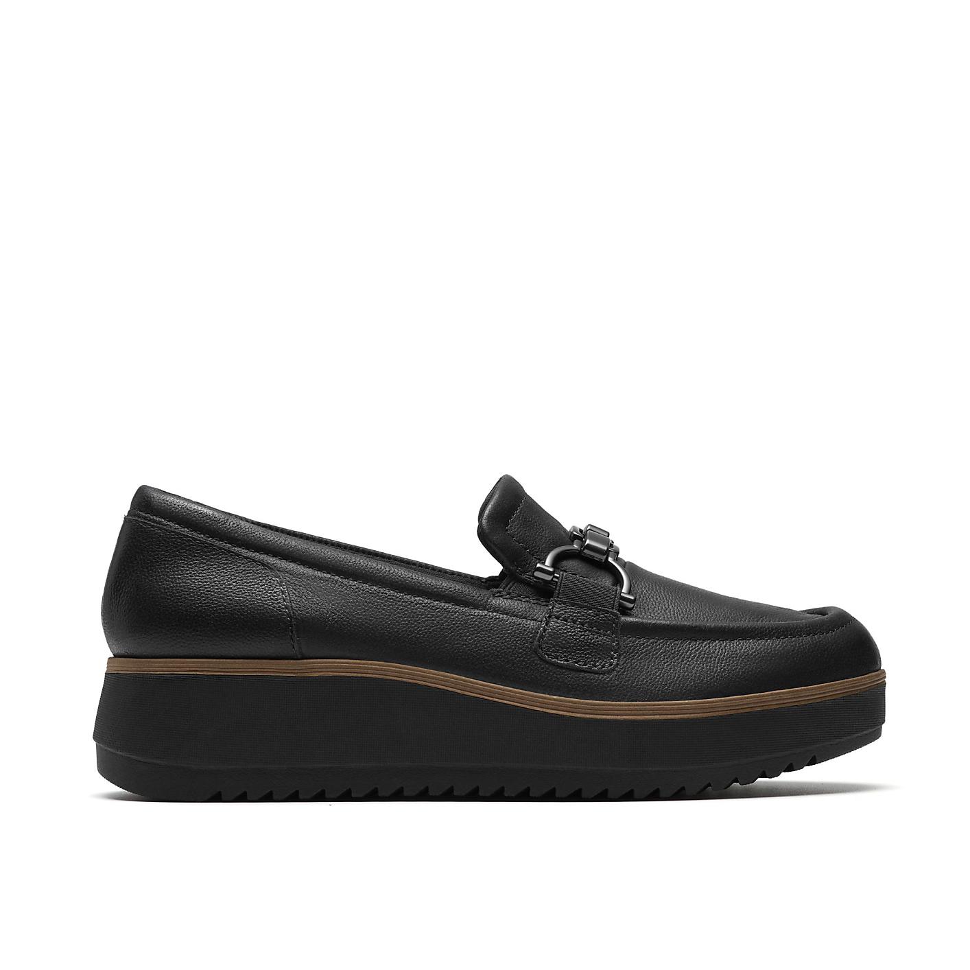 A black leather loafer with a thick platform sole sits centered against a plain white background. Product Image 1