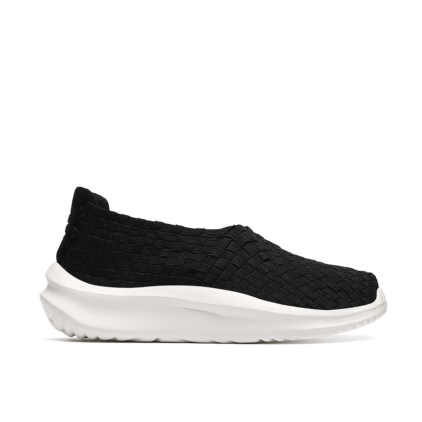 A black woven slip-on sneaker with a thick white sole is centered against a plain white background. Product Image 1
