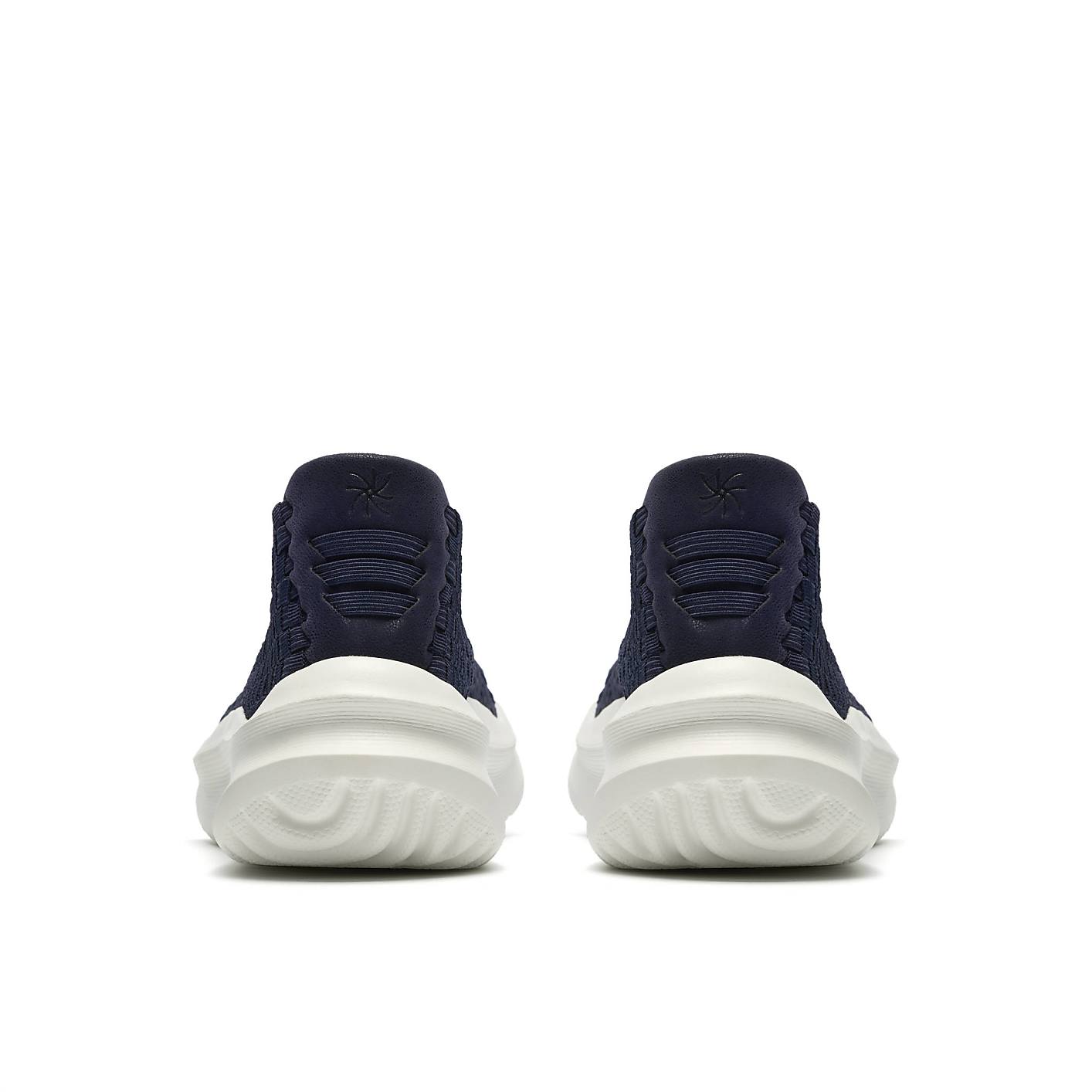 A pair of navy blue sneakers with thick white soles are positioned centrally against a plain white background. Product Image 2
