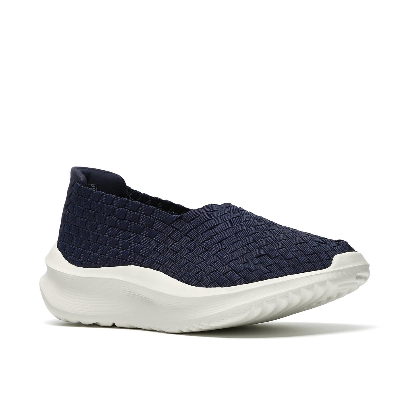 A navy blue woven slip-on shoe with a thick white sole sits against a plain white background. Product Image 5