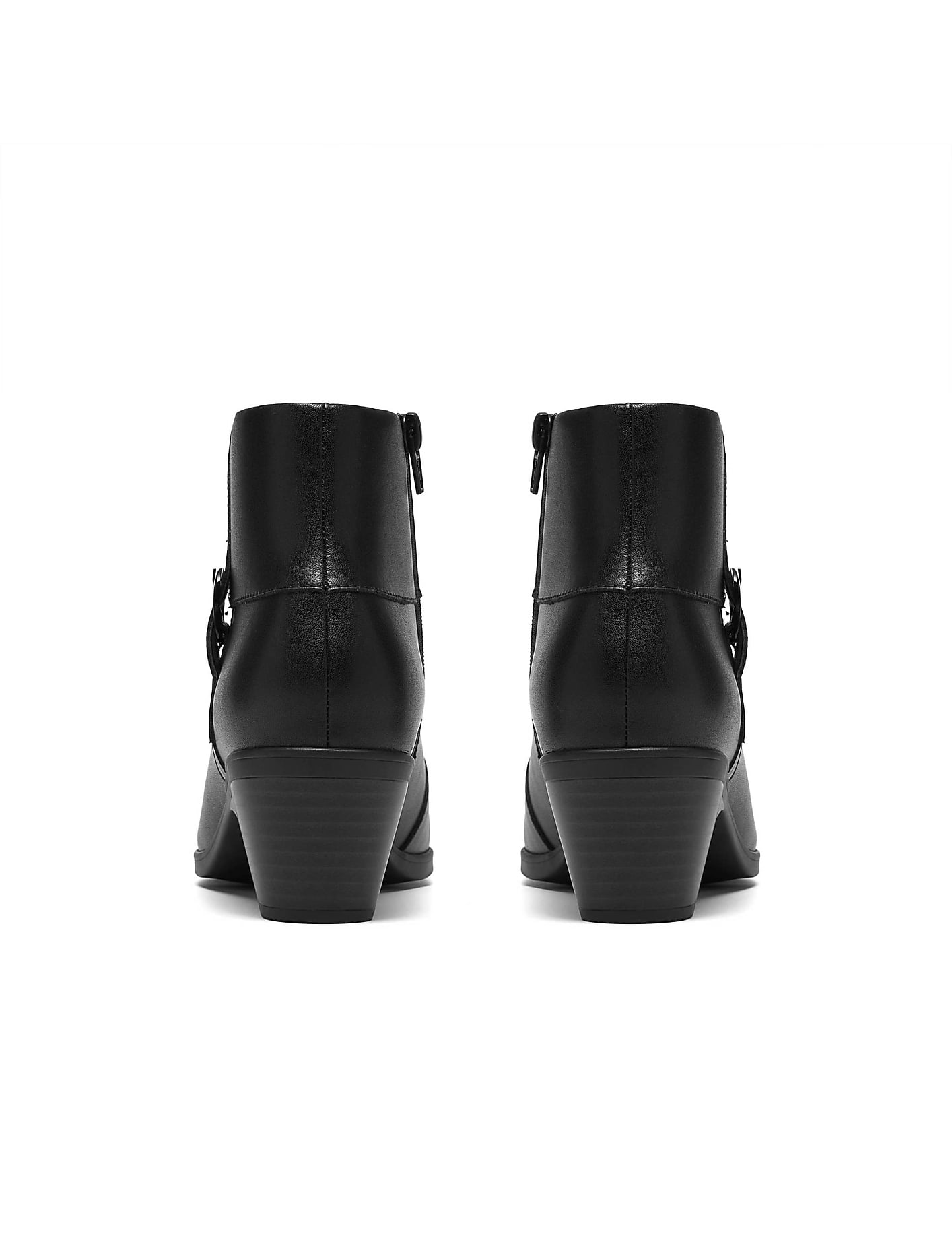 A pair of black heeled ankle boots are positioned side-by-side against a plain white background. Product Image 2