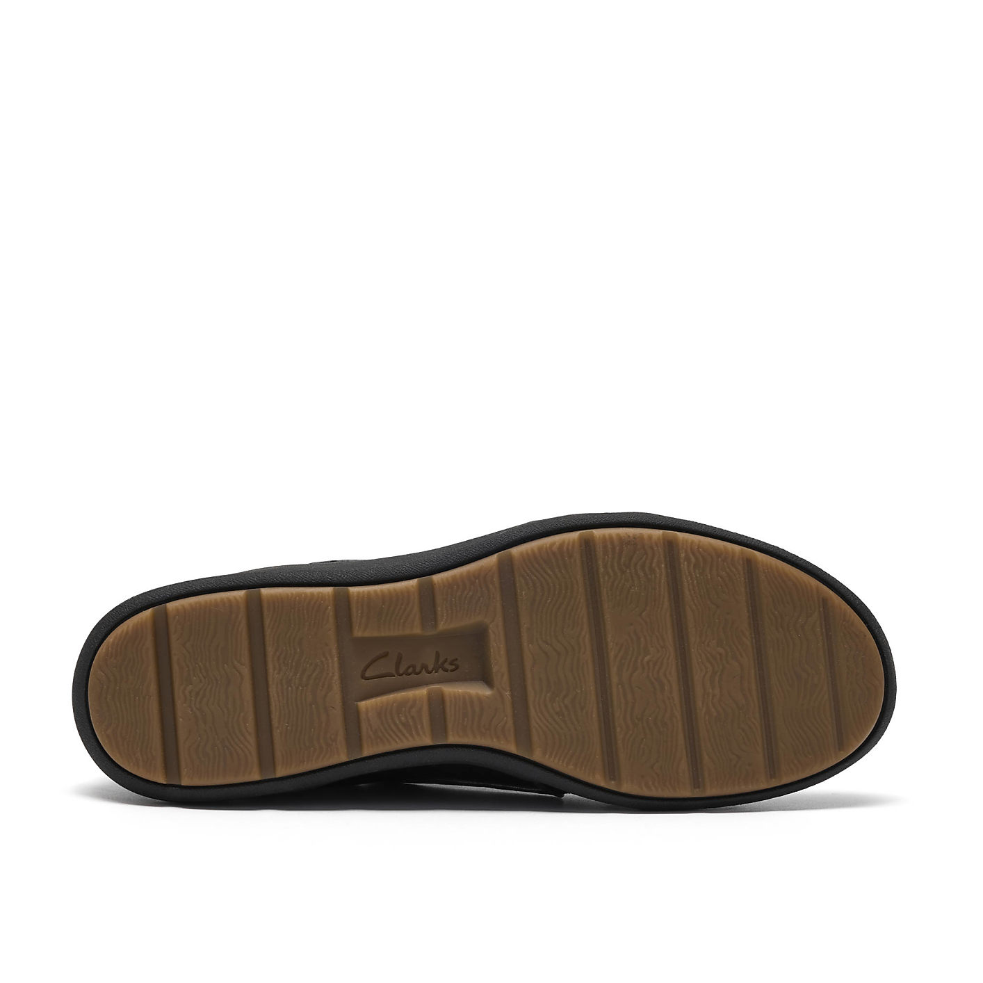 A brown textured Clarks shoe sole is centered against a plain white background. Product Image 4
