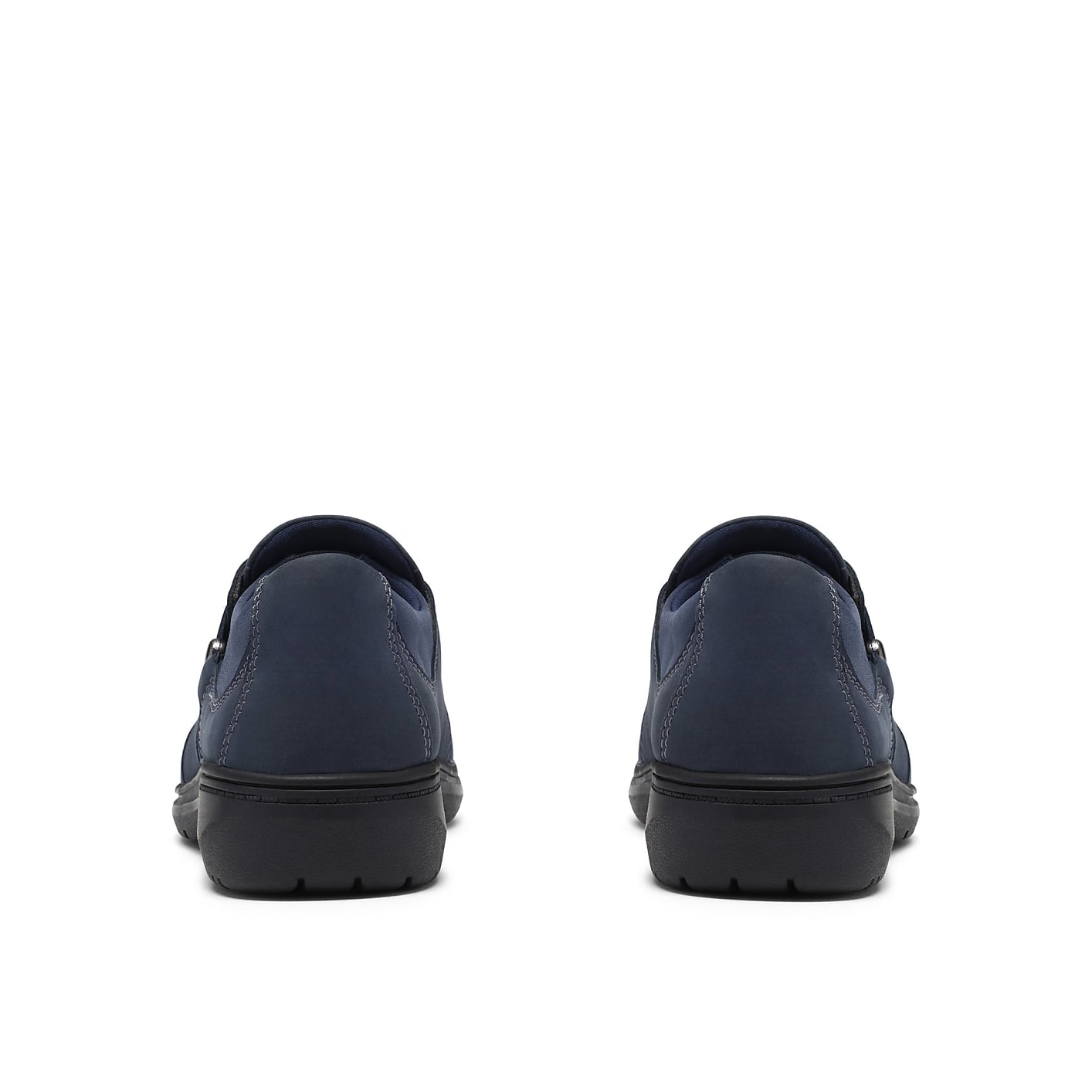 Two navy blue slip-on shoes are positioned side-by-side against a plain white background. Product Image 2