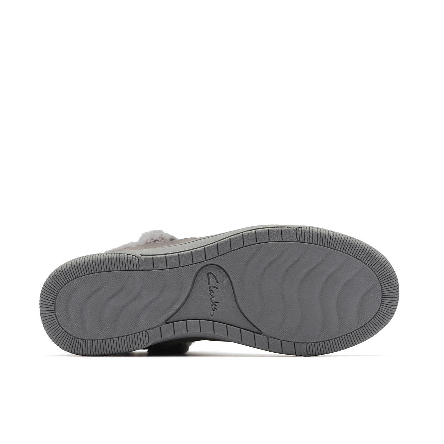 A grey Clarks shoe sole is positioned in the foreground against a plain white background. Product Image 4