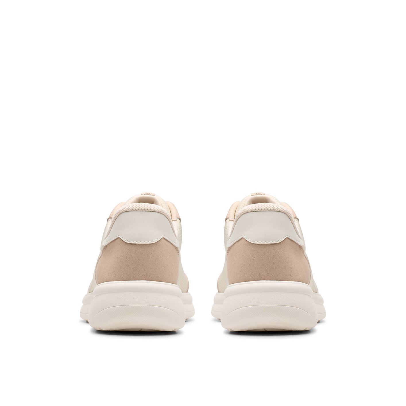 A pair of beige sneakers are positioned in the foreground against a plain white background. Product Image 2